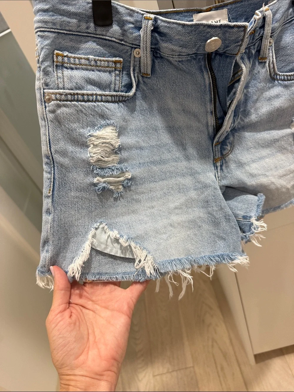 Frame Denim Light Wash Distressed Cutoff Shorts